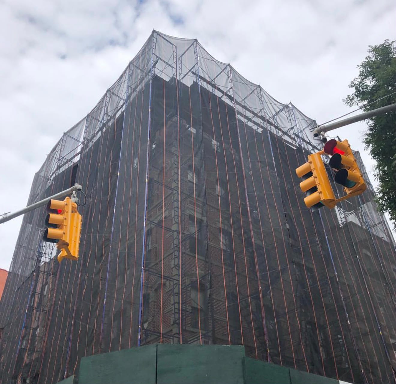 Scaffold and netting around a New York City building facade